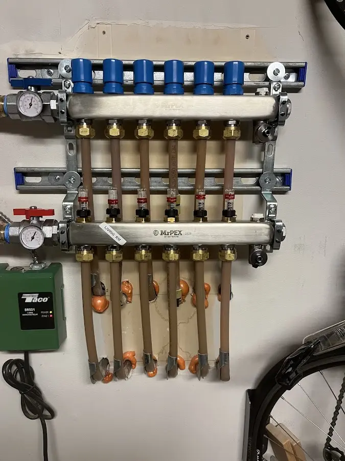 Plumber performing Leak Detection at a residential property in Baraga